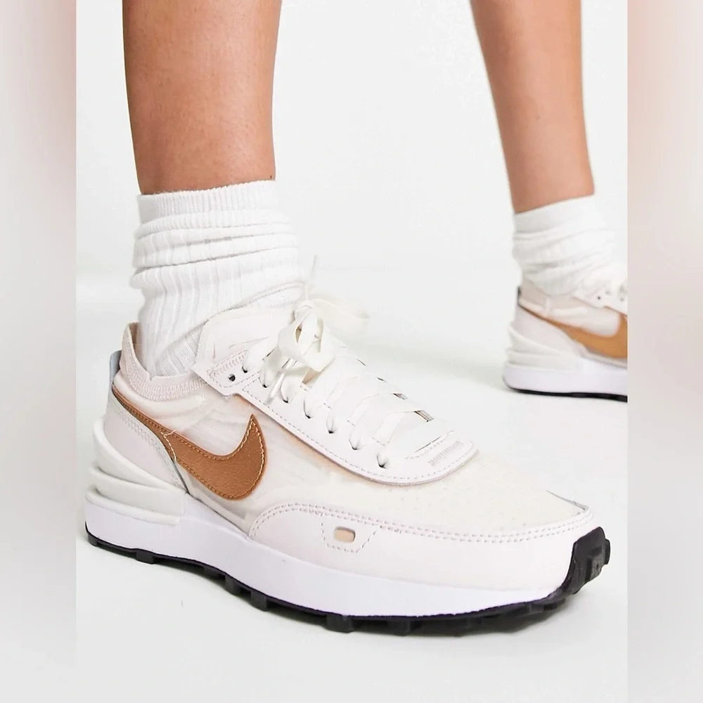 Nike Women's Sneakers in White with Metallic Rose Gold Swoosh